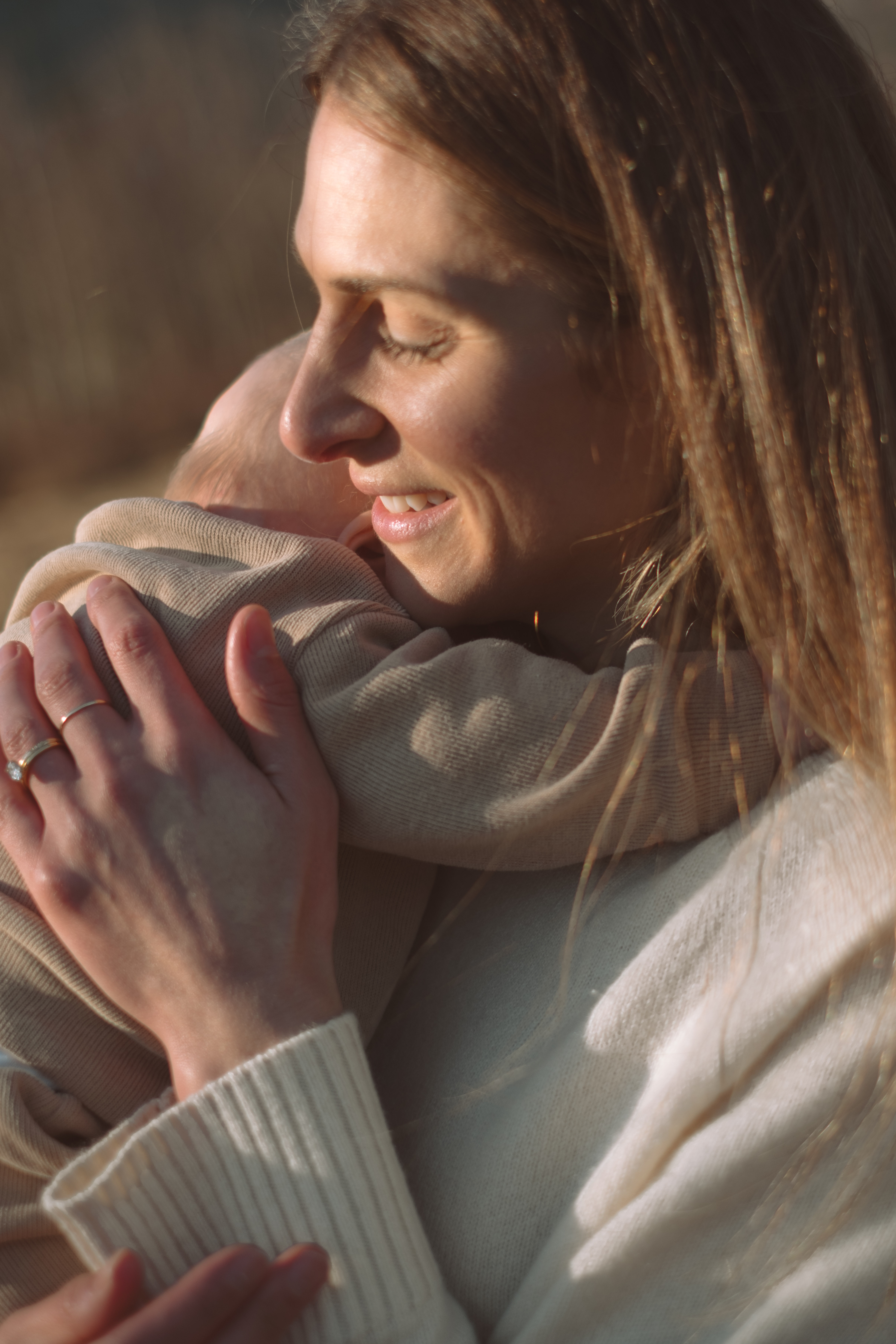 Hannah holding her baby